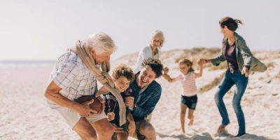Close up of family enjoying time on the beach